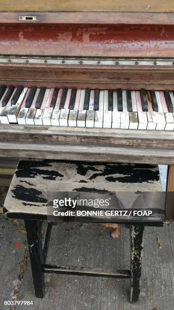 close-up of old piano and stool - bonnie rotten bildbanksfoton och bilder