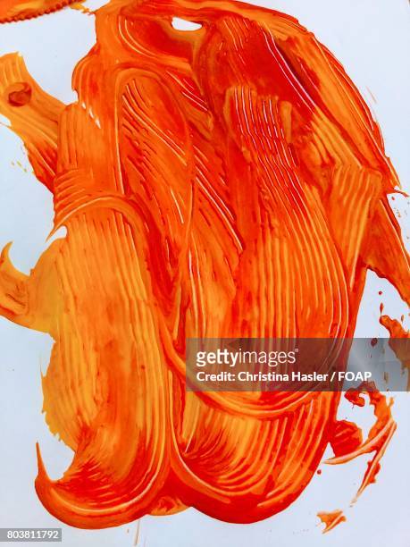 orange paint - christina rau stock-fotos und bilder