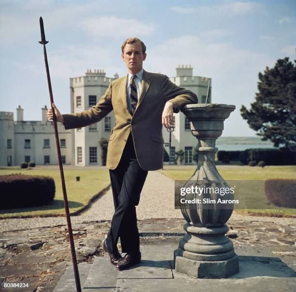 Desmond Fitzgerald, the 29th Knight of Glin, outside Glin Castle in County Limerick, 1963. The title dates back to the 14th century.