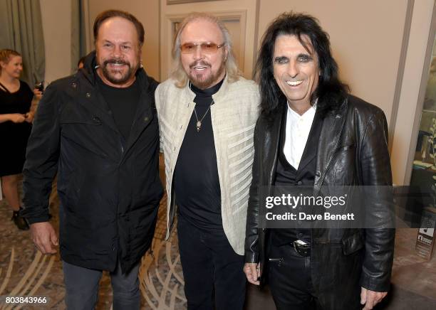 Harry Wayne Casey, Barry Gibb and Alice Cooper attend the Nordoff Robbins O2 Silver Clef Awards at The Grosvenor House Hotel on June 30, 2017 in...
