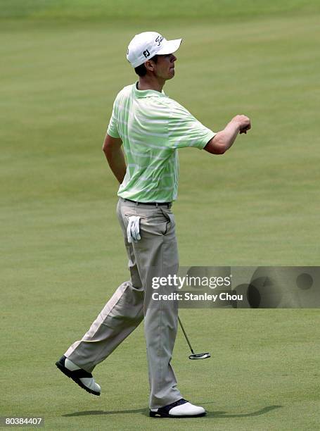 Adam Blyth of Australia reacts on the 18th hole during the Final Day of the Open Championship International Asia Final Qualifier held at the Sentosa...