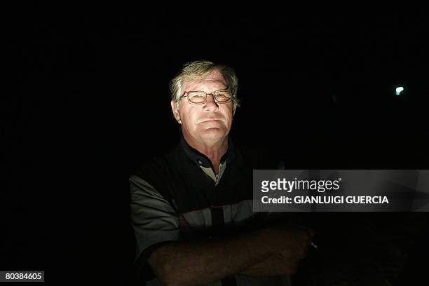 South African farmer Charles Du Plessis is portrayed as he patrols on March 17, 2008 the farming area of Waterpoort in South Africa in search of...