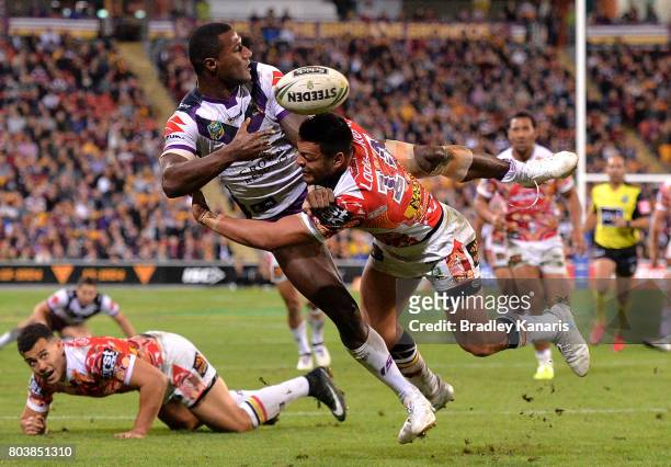 Sullies Vunivalu of the Storm gets a plays a shots away during the round 17 NRL match between the Brisbane Broncos and the Melbourne Storm at Suncorp...