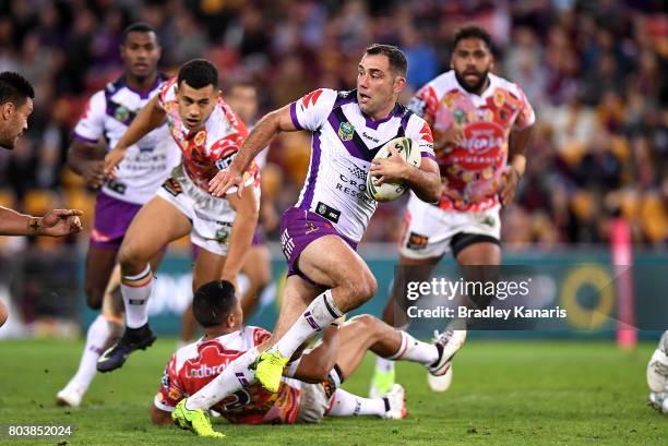 Cameron Smith of the Storm breaks away from the defence during the round 17 NRL match between the Brisbane Broncos and the Melbourne Storm at Suncorp...