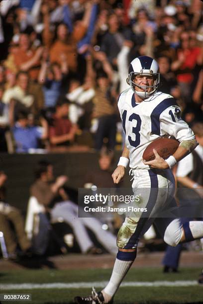 Wide receiver Lance Rentzel of the Los Angeles Rams runs upfield with a reception against the New Orleans Saints at the Los Angeles Memorial Coliseum...