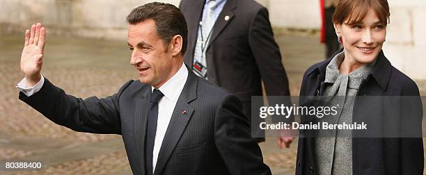 French President Nicolas Sarkozy and his wife Carla Bruni-Sarkozy depart Westminster Abbey after laying a wreath at the The Tomb Of The Unknown...