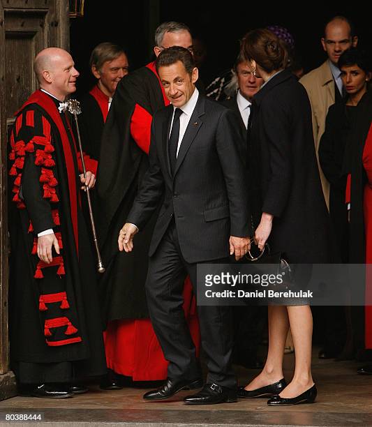 French President Nicolas Sarkozy and his wife Carla Bruni-Sarkozy depart after laying a wreath at the Tomb Of The Unknown Soldier at Westminster...