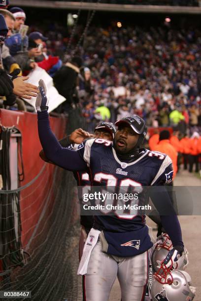 James Sanders of the New England Patriots celebrates with fans after their 21-12 win against the San Diego Chargers during the AFC Championship Game...