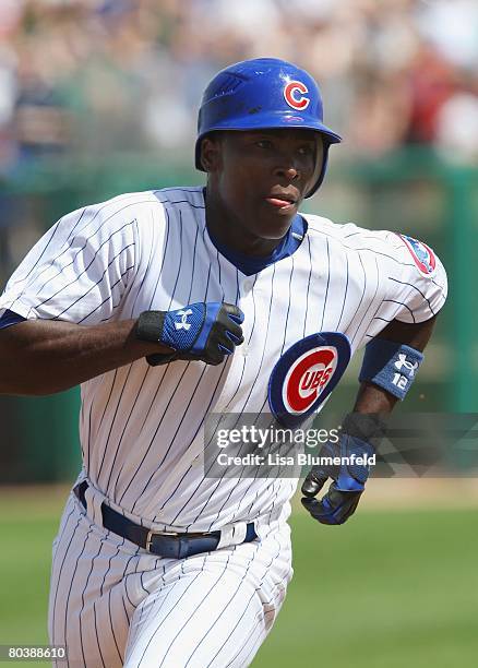 Alfonso Soriano of the Chicago Cubs runs to third base during a Spring Training game against of the Los Angeles Angels of Anaheim at HoHoKam Park on...