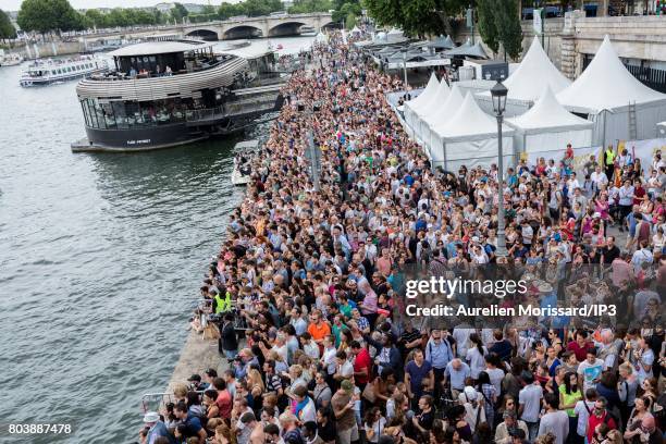 Lot of people attend the Olympic Day festivities on the quays of the Seine. On June 23, 2017 in Paris, France. On 23 and 24 June, Paris is...