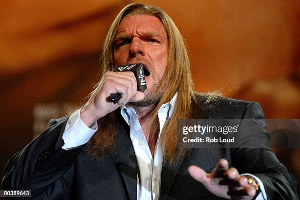 Wrestler Triple H speaks at a press conference for WrestleMania XXIV at the Hard Rock Cafe on March 26, 2008 in New York City.