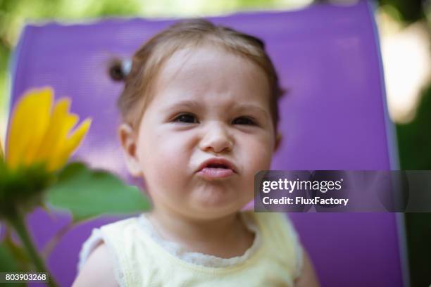 give me back my toy - baby pout stock pictures, royalty-free photos & images