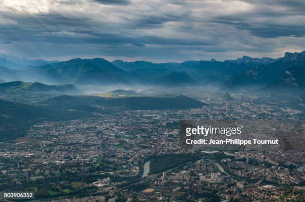 panoramic view over grenoble and the alps, france - grenoble stock pictures, royalty-free photos & images