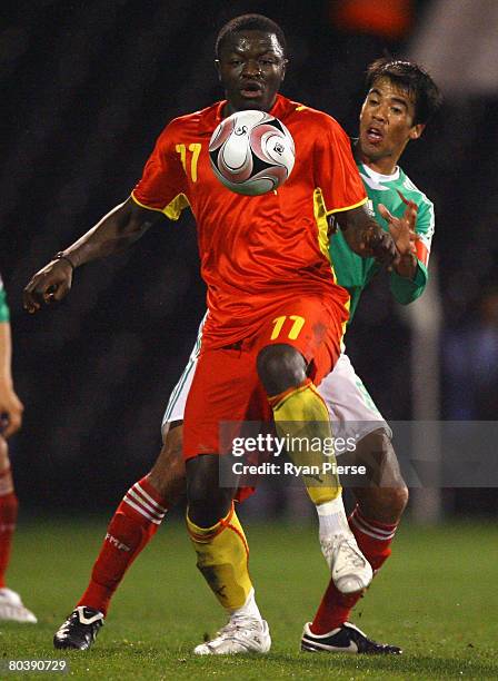 Sulley Muntari of Ghana competes for the ball against Pavel Pardo of Mexico during the International Friendly match between Ghana and Mexico at...