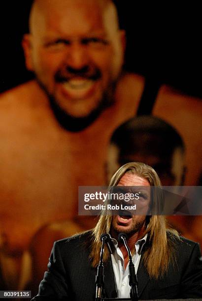 Wrestler Triple H speaks at a press conference for WrestleMania XXIV at the Hard Rock Cafe on March 26, 2008 in New York City.