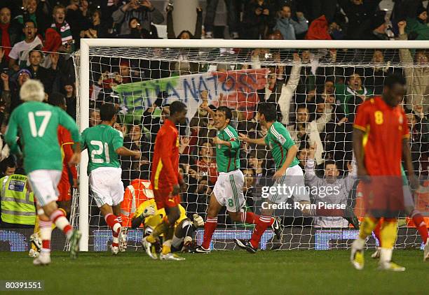 Pavel Pardo of Mexico celebrates after scoring his team's second goal during the international friendly match between Ghana and Mexico at Craven...