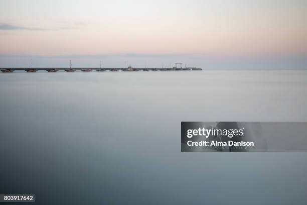 docking peninsula at sunset - alma danison stock pictures, royalty-free photos & images