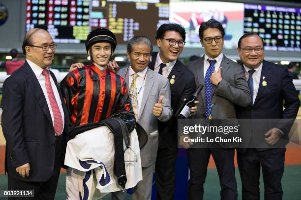 Jockey Alvin Ng Ka Chun, trainer Tony Cruz and owner Siu Pak Kwan, Martin Siu Kim Sun, Edmond Siu Kim Ping celebrate after Time Warp winning the Race...