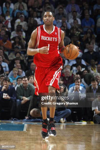 Tracy McGrady of the Houston Rockets dribbles downcourt against the New Orleans Hornets during the NBA game on March 19, 2008 at the New Orleans...