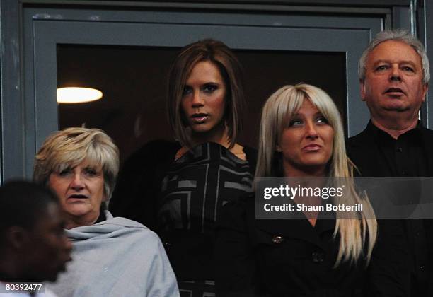 Victoria Beckham looks on from the stands prior to the International Friendly match between France and England at the Stade de France on March 26,...