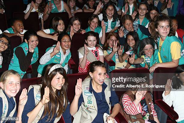 Actress Abigail Breslin, center, and members of The Girl Scouts of the USA attend a ceremony inducting Breslin into the organization held at 20th...