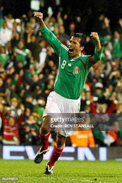 Mexican player Pavel Pardo celebrates after scoring a penatly against Ghana during a friendly game at Craven Cottage in London, on March 26, 2008....