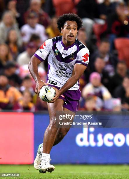 Felise Kaufusi of the Storm runs with the ball during the round 17 NRL match between the Brisbane Broncos and the Melbourne Storm at Suncorp Stadium...