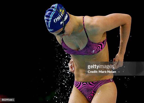 Sophie Edington of NSW warms up in a bikini before the second semi final of the womens 50 metre butterfly during day six of the 2008 Australian...