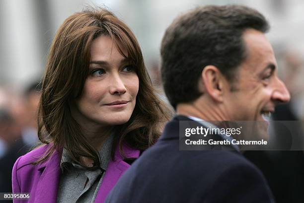 French President Nicolas Sarkozy and his wife Carla Bruni-Sarkozy attend the laying of a wreath at the Statue Of Charles De Gaulle on March 27, 2008...
