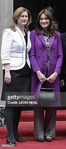 Sarah Brown, wife of British Prime Minister Gordon Brown, and Carla Bruni-Sarkozy, wife of French President Nicolas Sarkozy, pose for pictures...