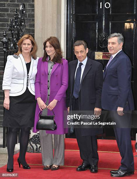 Sarah Brown, Carla Bruni-Sarkozy,French President Nicolas Sarkozy and British Prime Minister Gordon Brown pose in front of Downing Street on March...