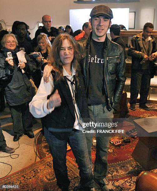 Veteran rocker Patti Smith poses with her son Jackson, on March 27, 2008 during a visit of the exhibition called "Patti Smith, Land 250" at the...