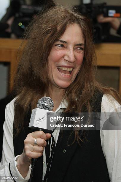 Veteran rocker Patti Smith holds a press conference during an exhibition called 'Patti Smith, land 250' at the Fondation Cartier on March 27, 2008 in...