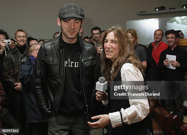 Veteran rocker Patti Smith holds a press conference with her son Jackson during an exhibition called 'Patti Smith, land 250' at the Fondation Cartier...