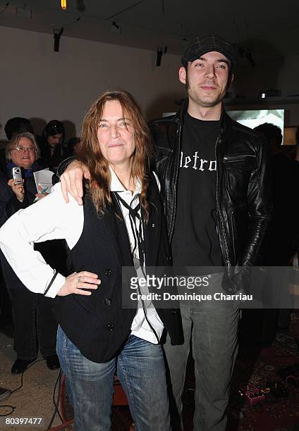 Patti Smith and her son Jackson attend the Patti Smith exhibition "Land 250" presented by La Fomndation Cartier on March 27, 2008 Paris, France.