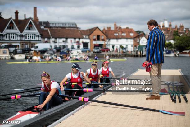 Rowing crew prepare ahead of a race at the Henley Royal Regatta on June 30, 2017 in Henley-on-Thames, England. The five day Henley Royal Regatta is...