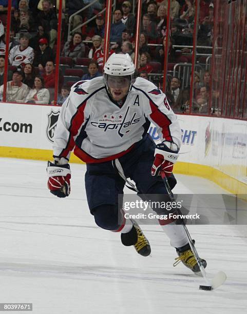 Alex Ovechkin of the Washington Capitals carries the puck against the Carolina Hurricanes during the NHL game on March 25, 2008 at RBC Center in...