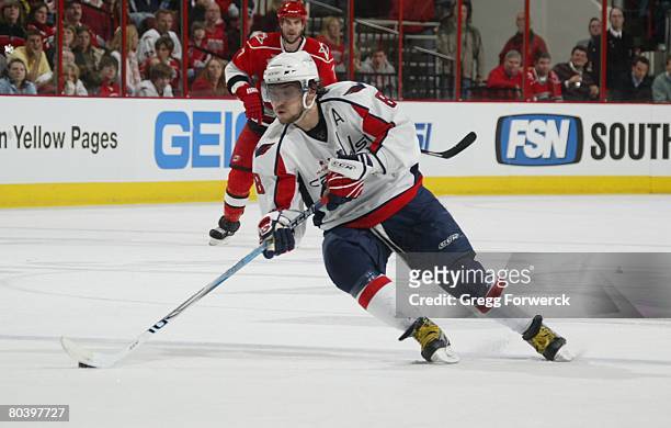Alex Ovechkin of the Washington Capitals carries the puck during the NHL game against ther Carolina Hurricanes on March 25, 2008 at RBC Center in...