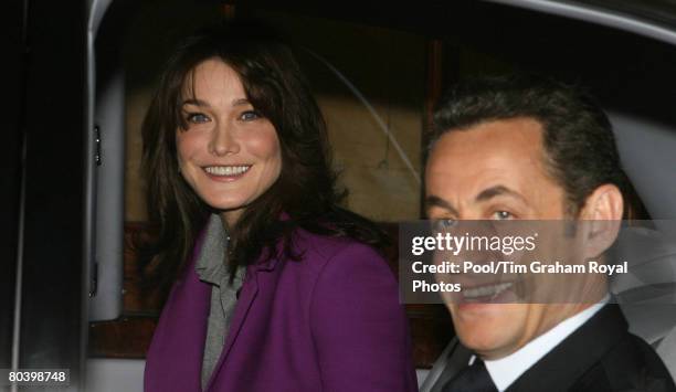 Carla Bruni-Sarkozy and her husband, French President Sarkozy, leave Windsor Castle by limousine on the second day of their State Visit on March 27,...