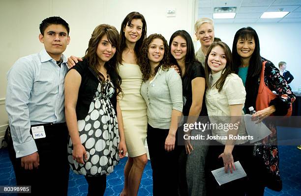 Actress Kate Walsh poses with attendees at the "Stand Up For Real Sex Education" congressional briefing March 27, 2008 in Washington, DC. The...