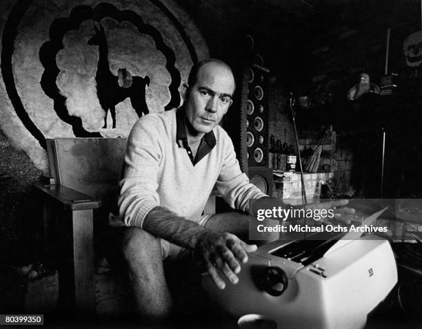 Journalist Hunter S. Thompson sits at his typewriter at his ranch circa 1976 near Aspen Colorado.