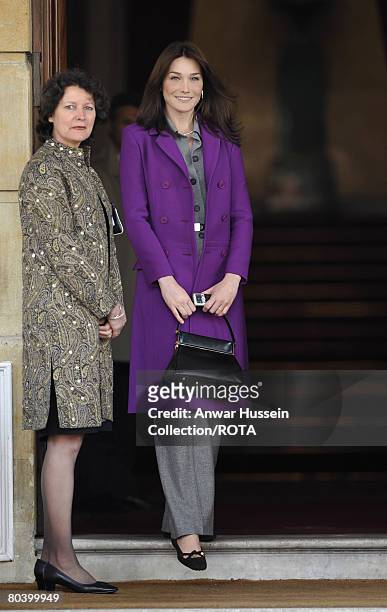 First Lady of France Carla Bruni-Sarkozy poses as she arrives at Lancaster House for a luncheon with British Prime minister's wife Sarah Brown on...