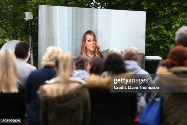 Video tribute from singer Mariah Carey is played during the funeral of Martyn Hett at Stockport Town Hall on June 30, 2017 in Stockport, England. 29...