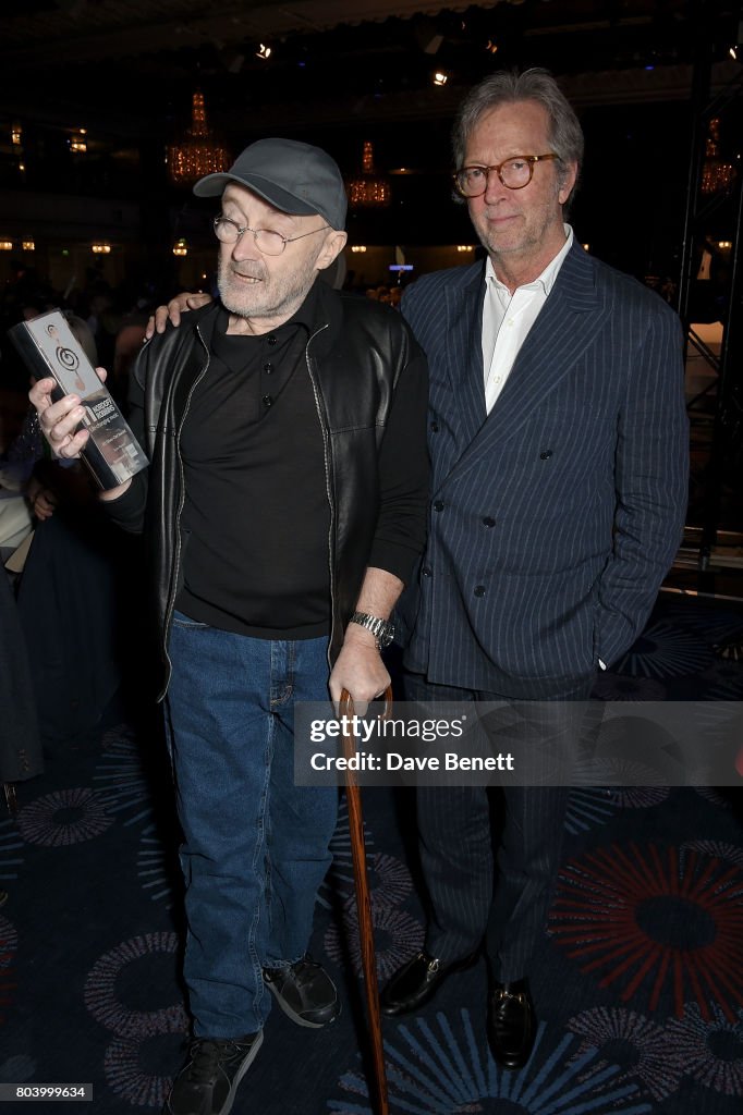 Phil Collins and Eric Clapton at the Nordoff Robbins O2 Silver Clef