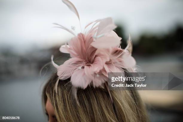 Floral fascinator is worn at the Henley Regatta on June 30, 2017 in Henley-on-Thames, England. The five day Henley Royal Regatta is now in its 178th...