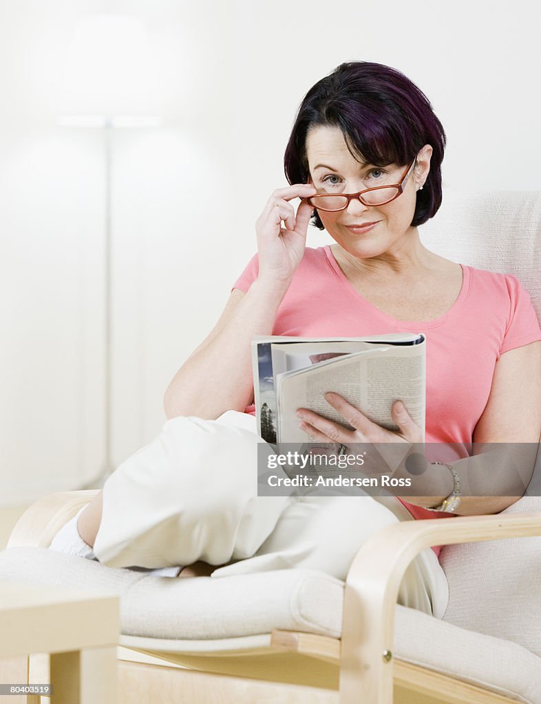 Woman sitting chair with book