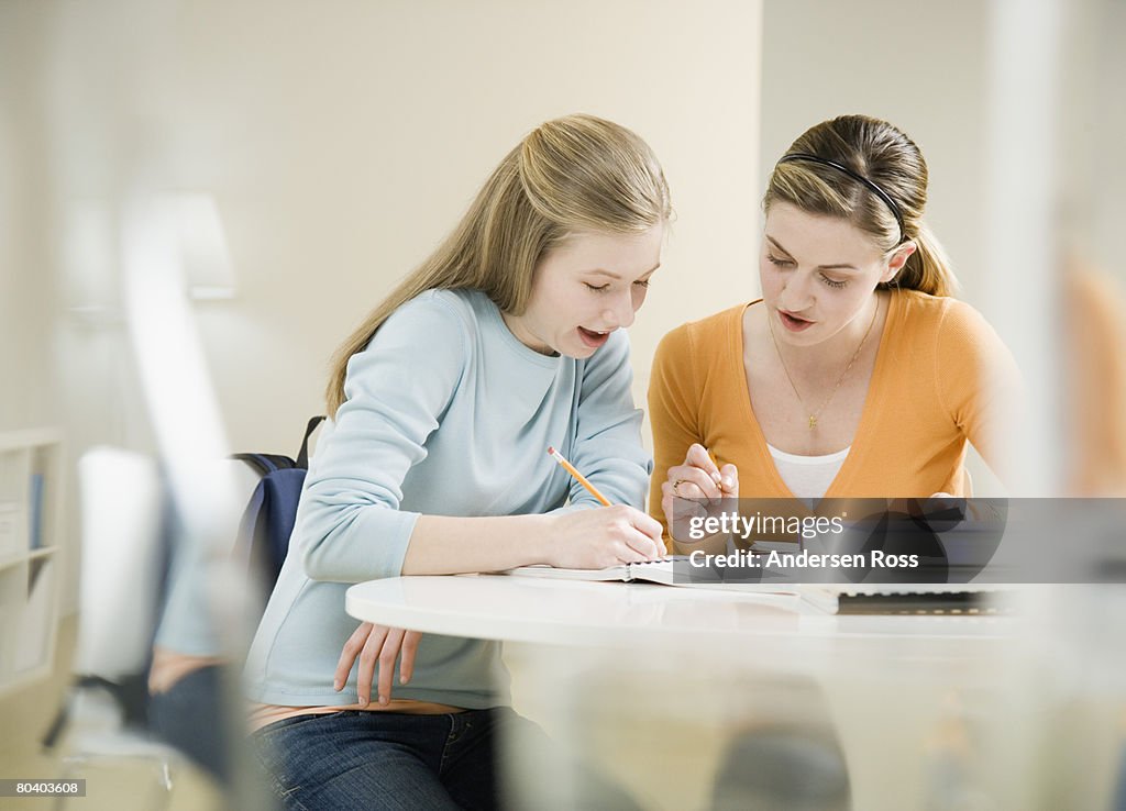 Teenage girls doing homework