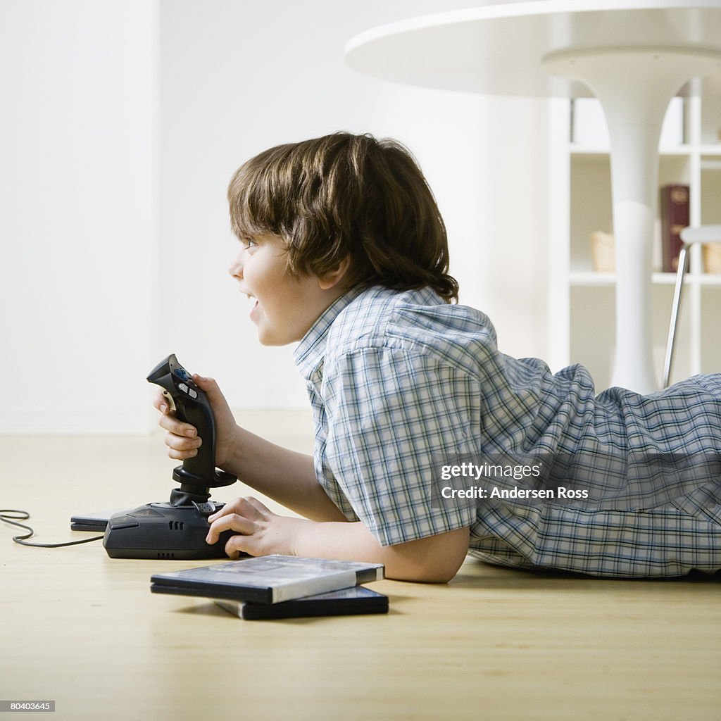 Boy playing videogame