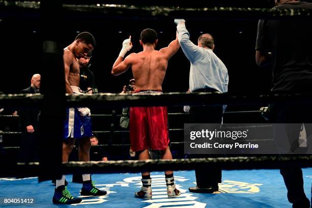 Avery Sparrow is presented as the winner over Isaelin Florian during a lightweight bout at the Sands Bethlehem Event Center on June 27, 2017 in...