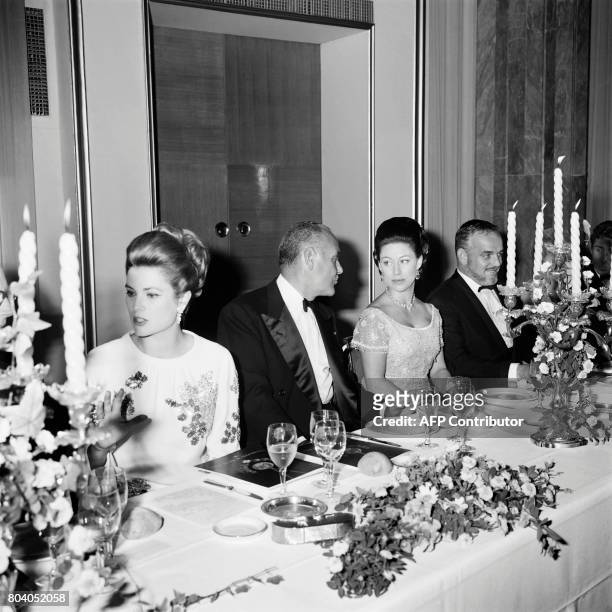 Prince Rainier III of Monaco , Princess Grace of Monaco and Alpes-Maritimes prefect Pierre-Jean Moatti attend a diner in honor of Princess Margaret...